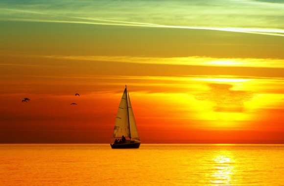 Sailing Boat At Sunset