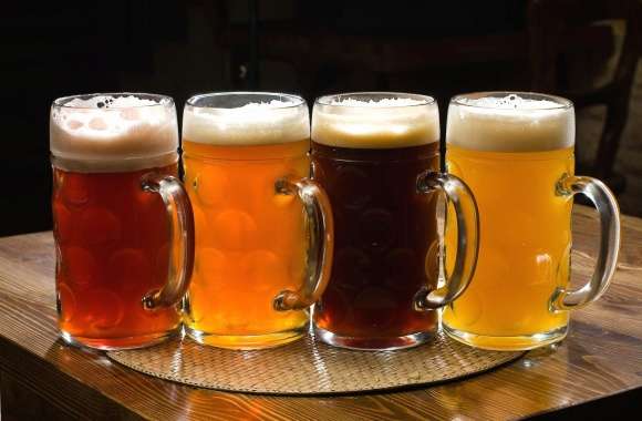 Four glasses of different beer