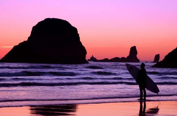 Surfer At Sunset Cannon Beach Oregon