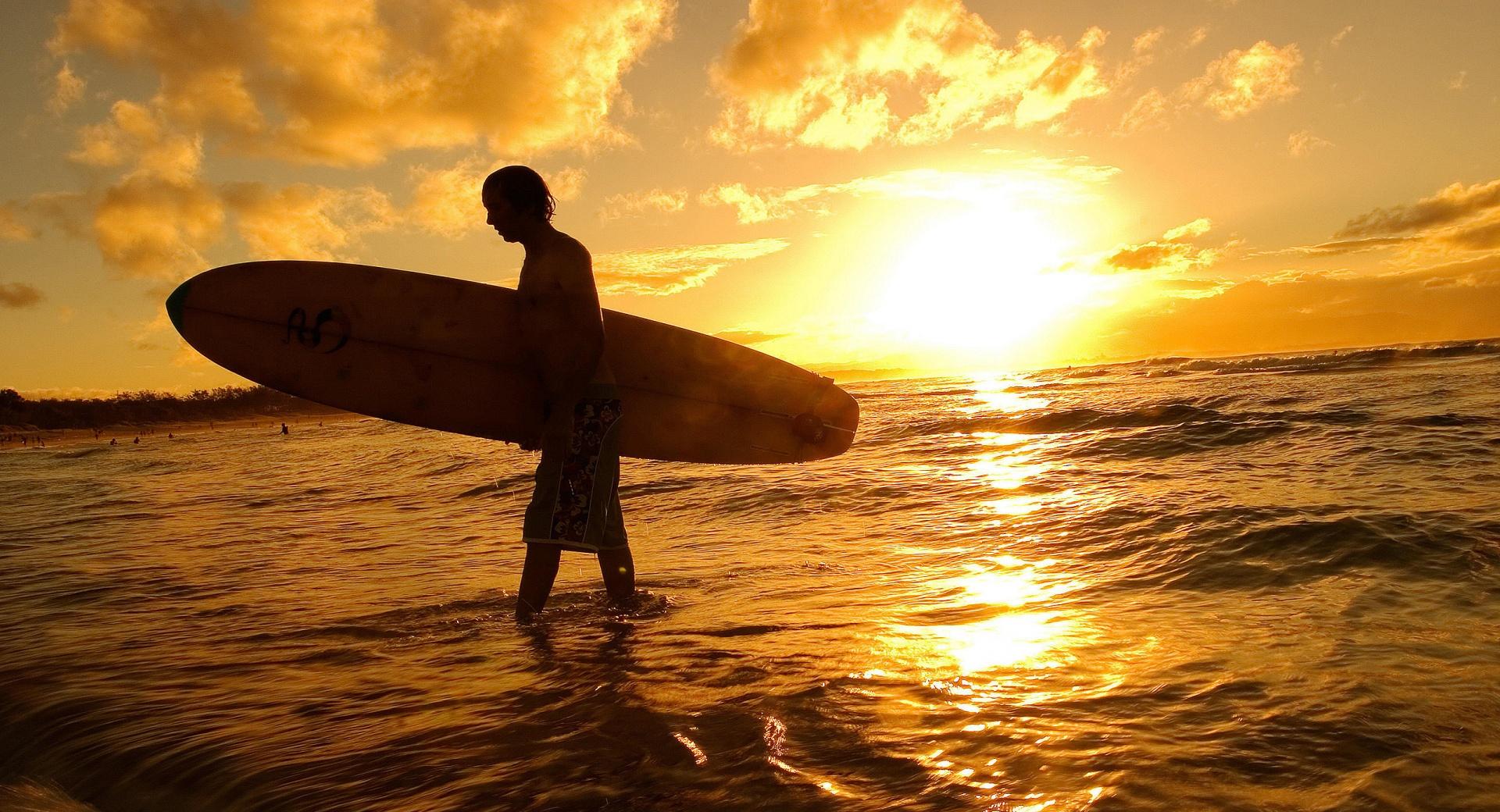 Surfer At Sunset at 2048 x 2048 iPad size wallpapers HD quality