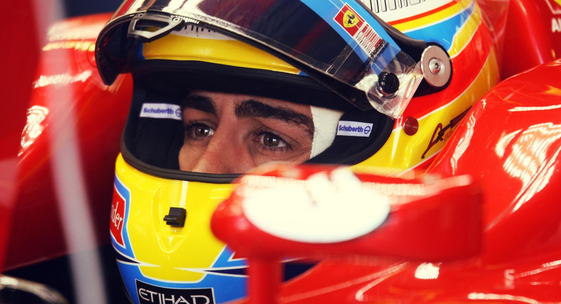 Fernando Alonso Ferrari at 320 x 480 iPhone size wallpapers HD quality