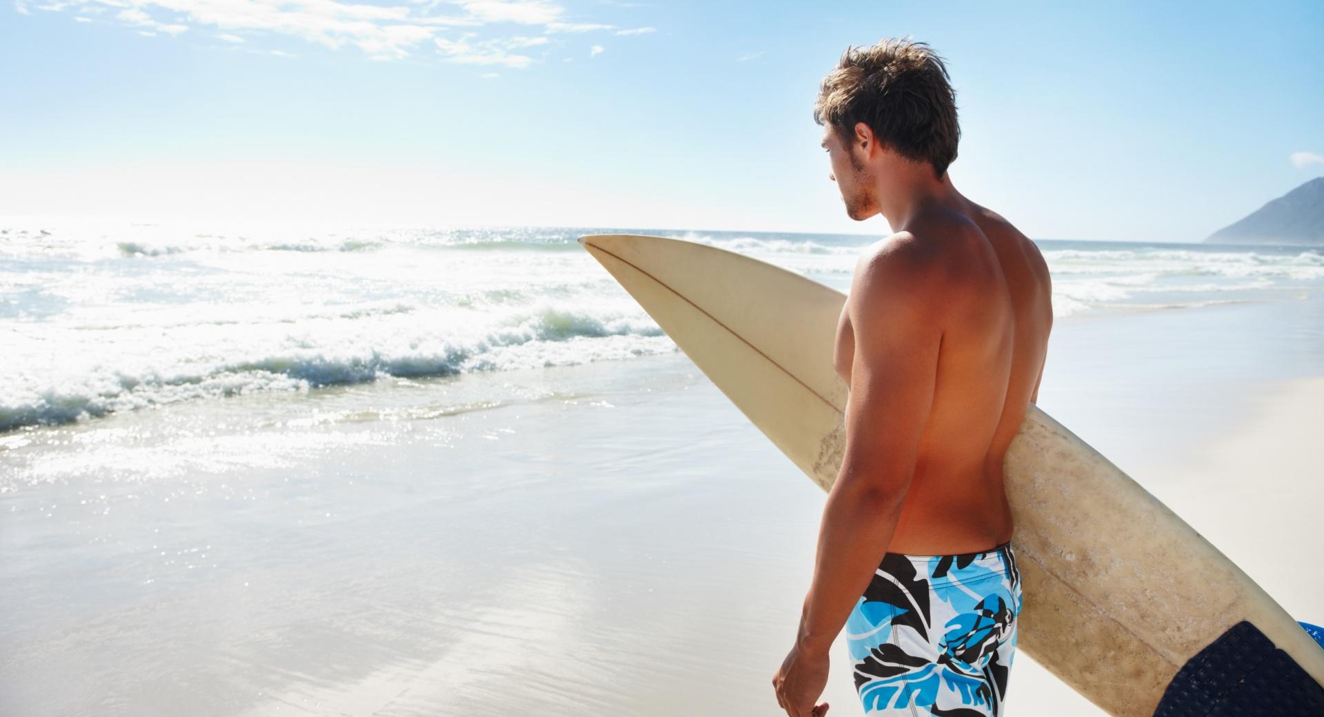 Man With Surf Board at 1152 x 864 size wallpapers HD quality