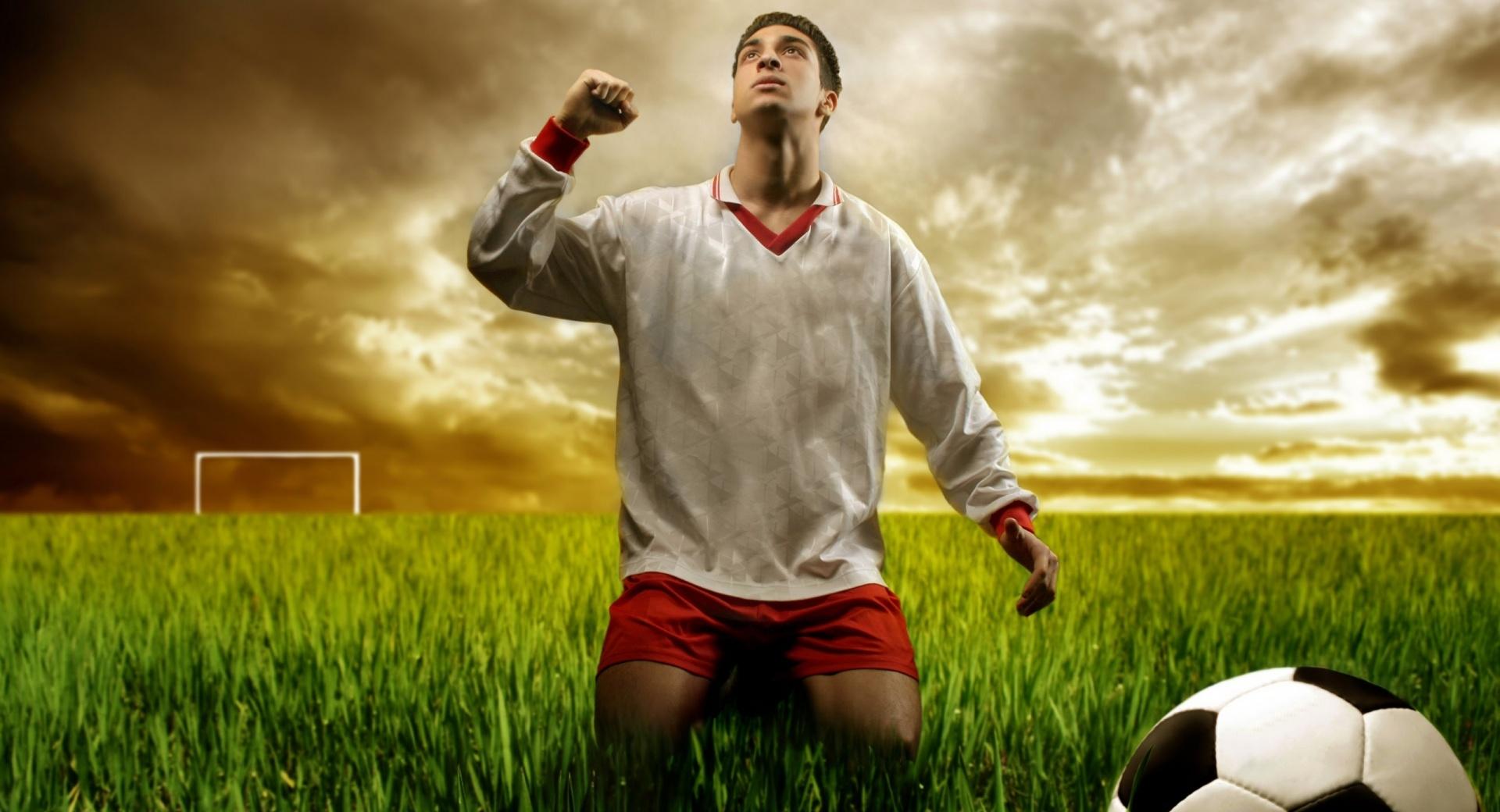 Soccer Player Praying at 1024 x 1024 iPad size wallpapers HD quality