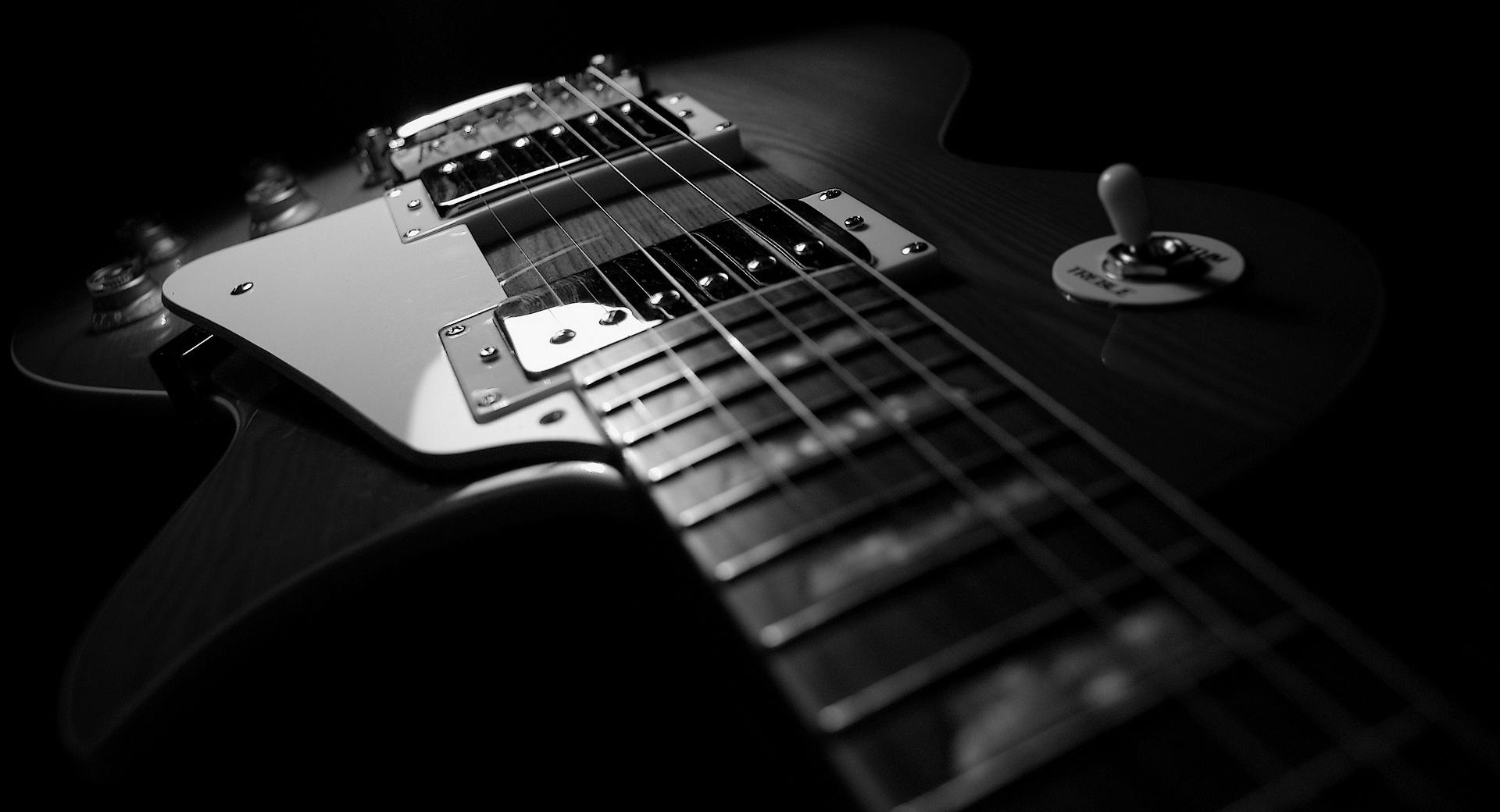 Black Guitar at 1600 x 1200 size wallpapers HD quality