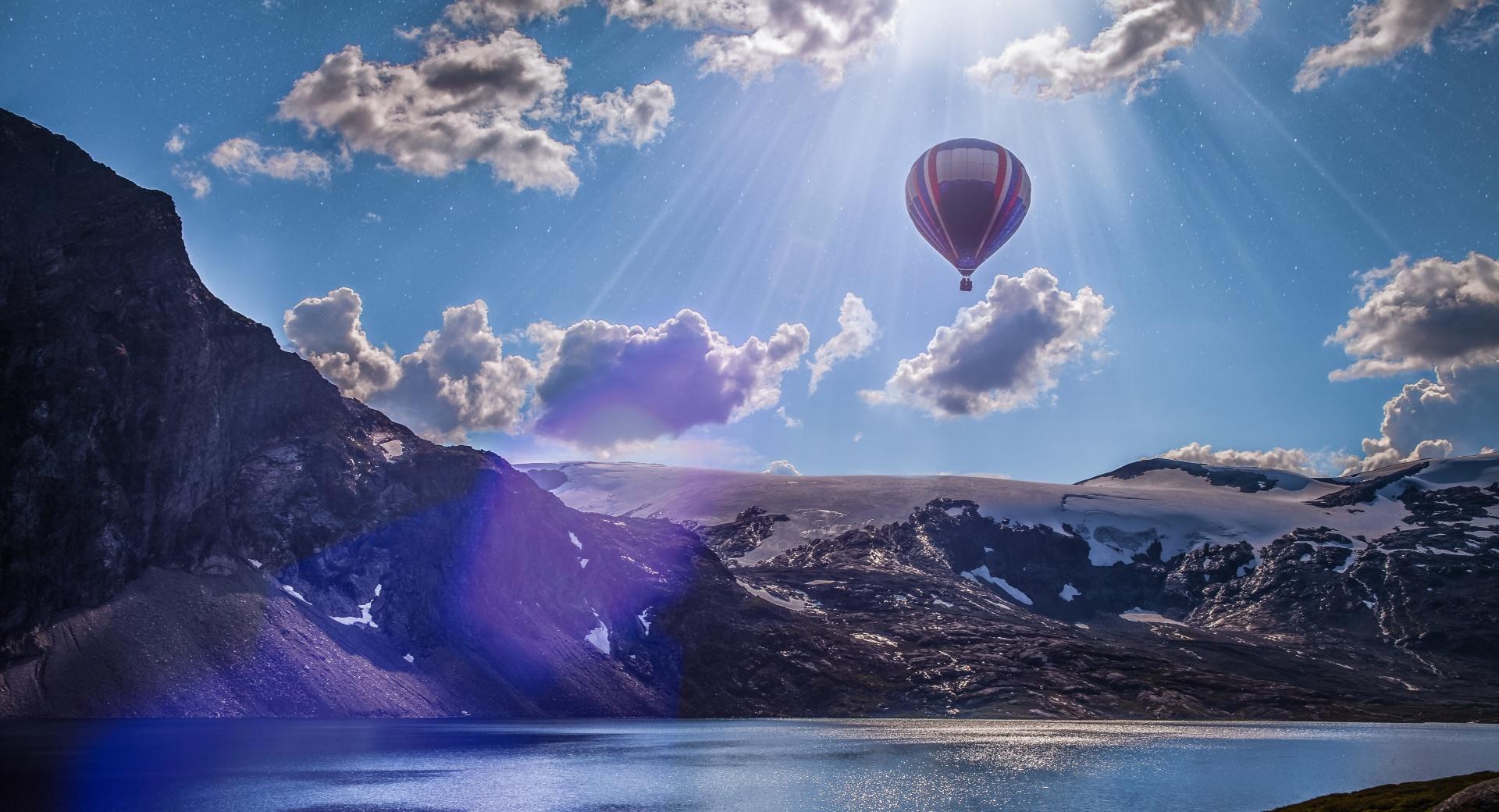 Hot Air Balloon Over Mountains at 640 x 1136 iPhone 5 size wallpapers HD quality