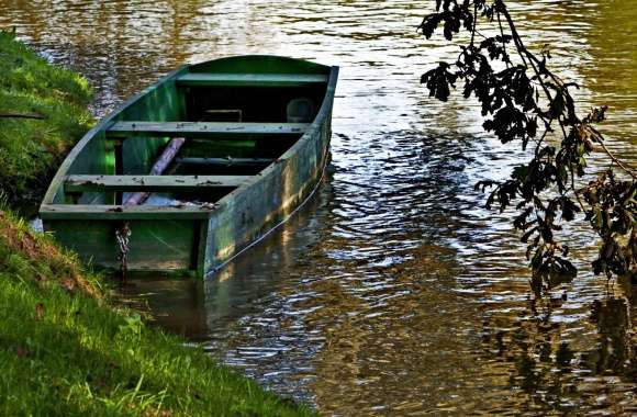 Empty Boat at a River Bank in Slovenia