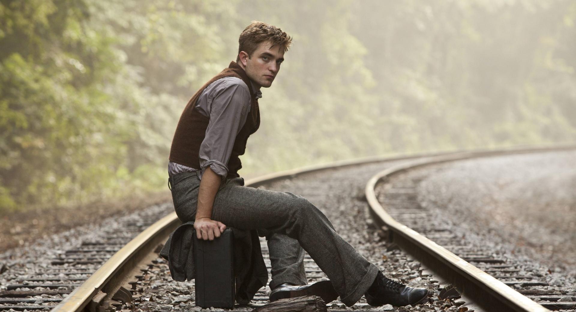 Robert Pattinson On Rail Track at 2048 x 2048 iPad size wallpapers HD quality