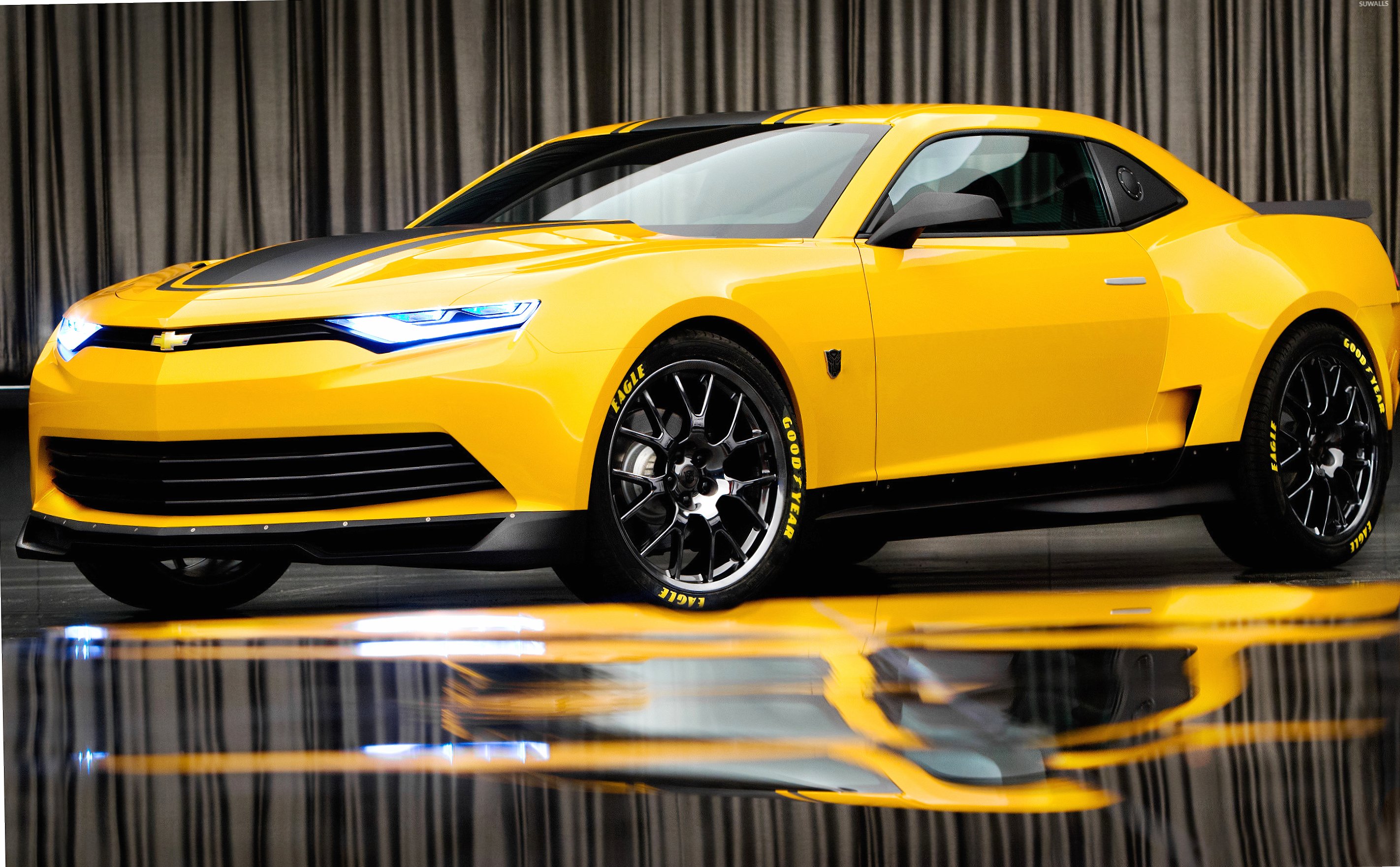 Yellow Chevrolet Camaro with headlights on at 1334 x 750 iPhone 7 size wallpapers HD quality