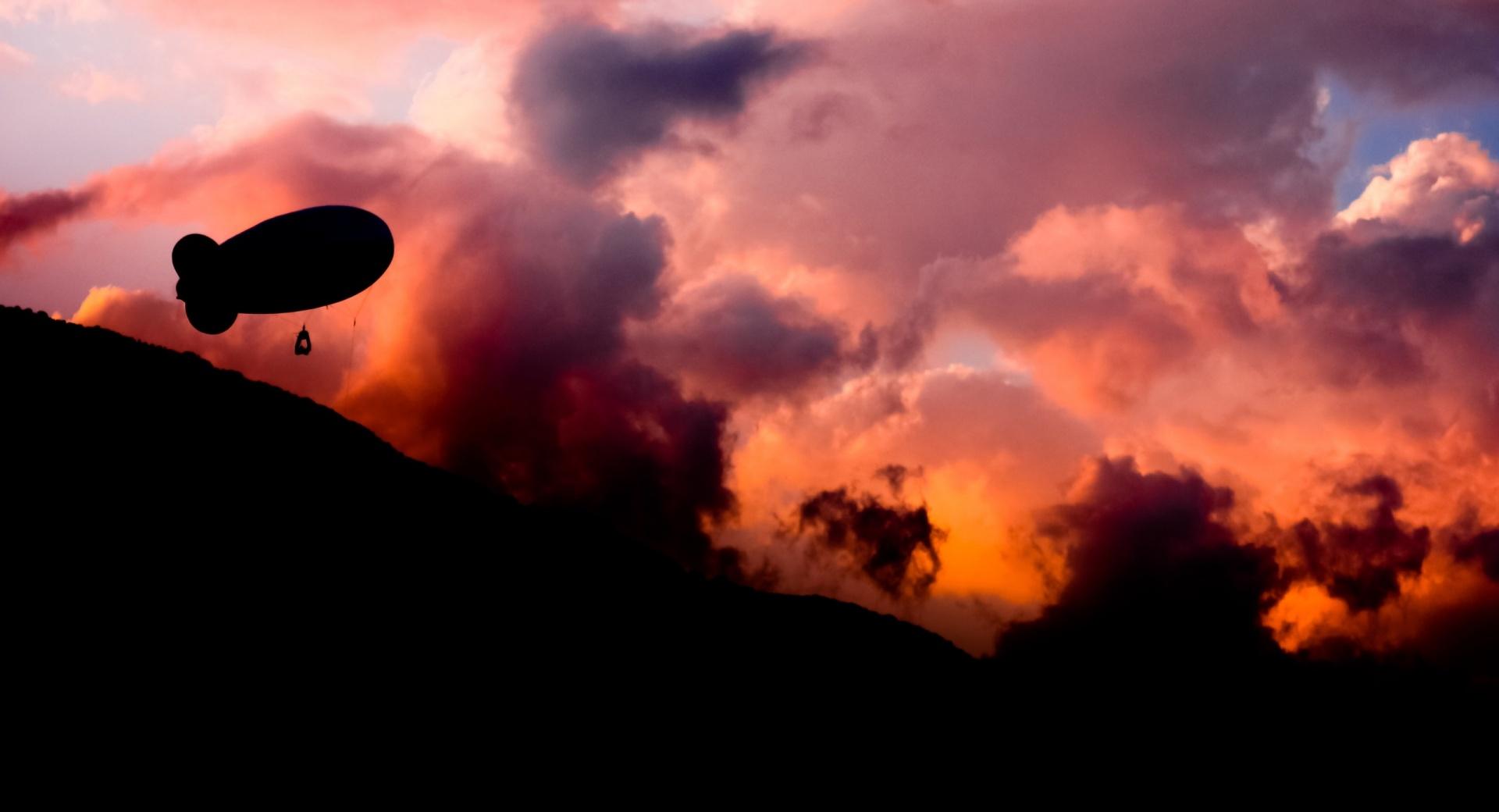 Airship At Sunset at 640 x 1136 iPhone 5 size wallpapers HD quality