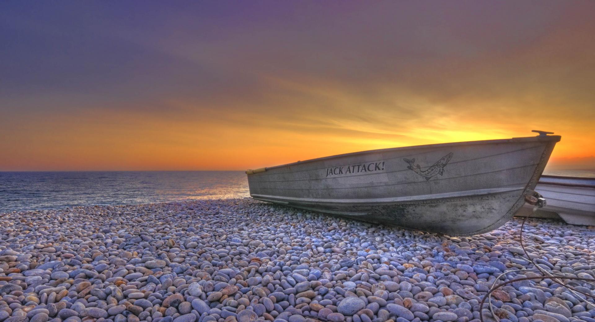 Boat On Pebbles Beach wallpapers HD quality