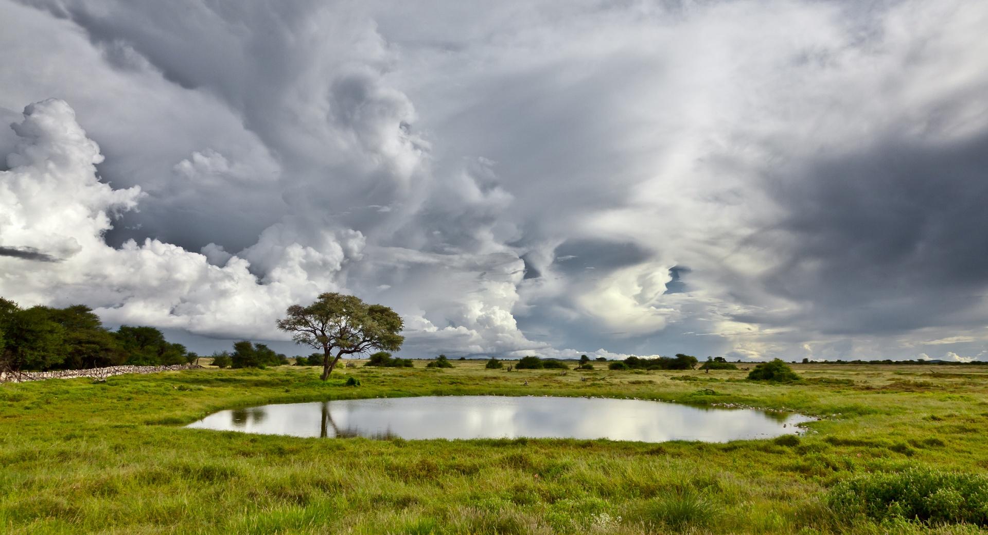 Pond And Storm Clouds at 1600 x 1200 size wallpapers HD quality