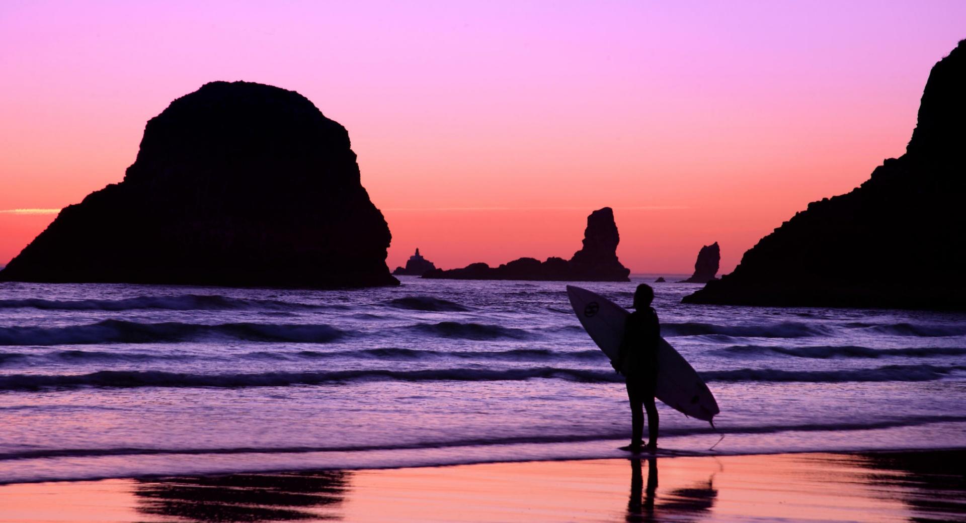 Surfer At Sunset Cannon Beach Oregon wallpapers HD quality
