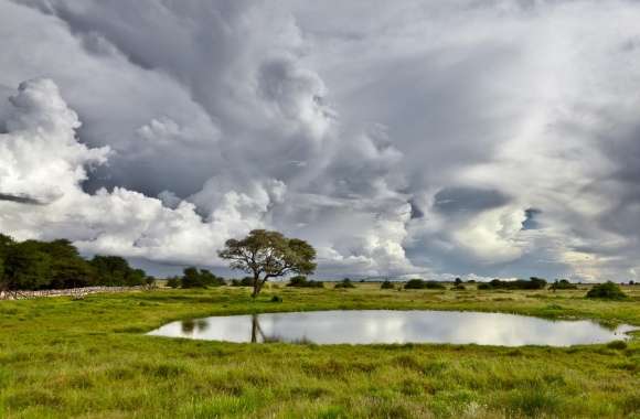 Pond And Storm Clouds