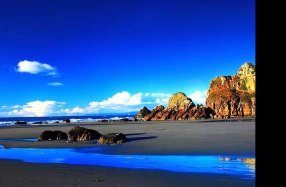 black sand beach and blue sea