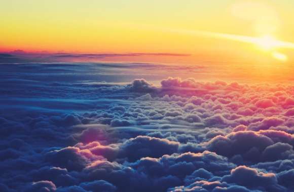 Sunrise Above The Clouds