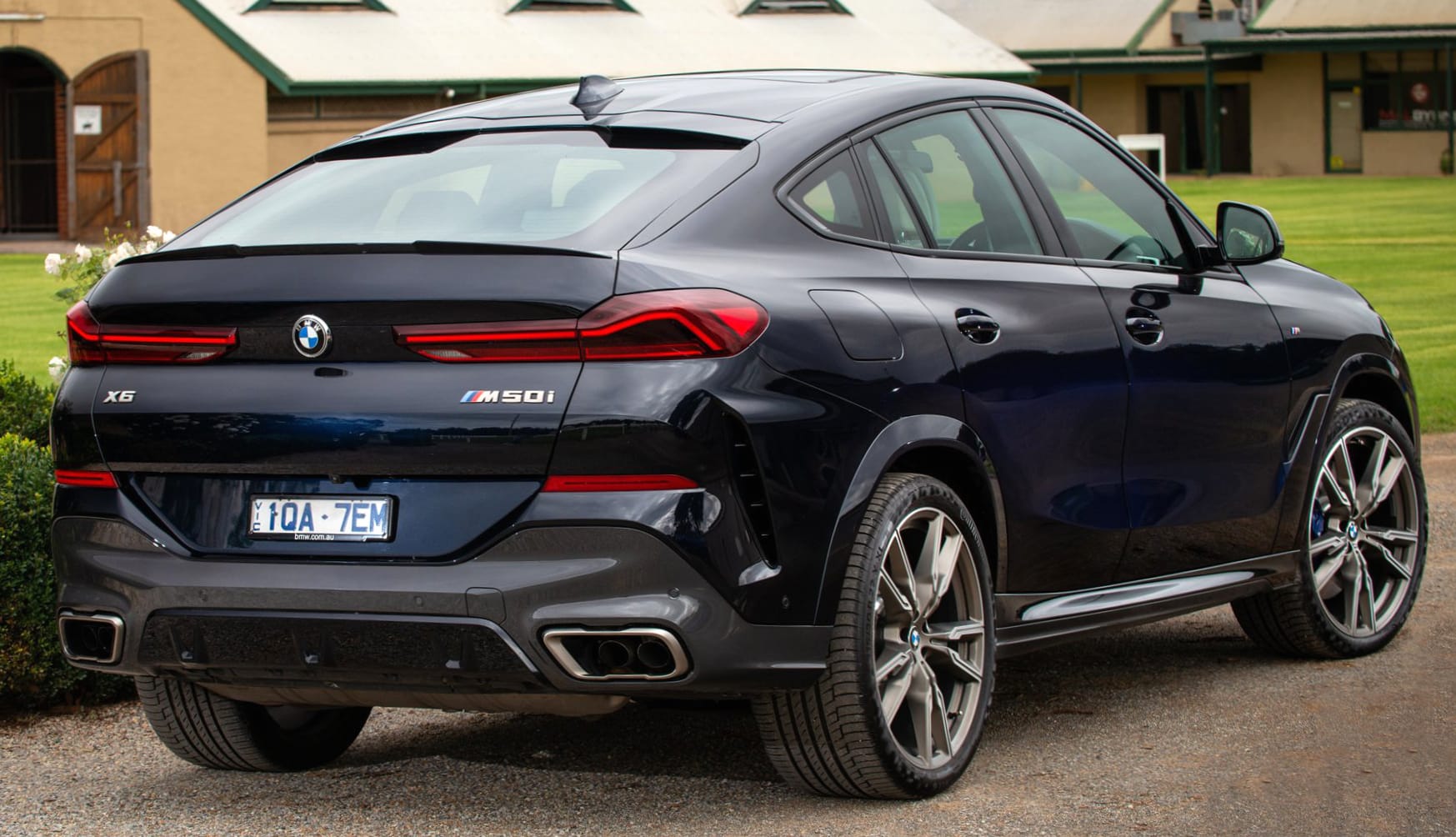 BMW X6 M50i at 640 x 1136 iPhone 5 size wallpapers HD quality