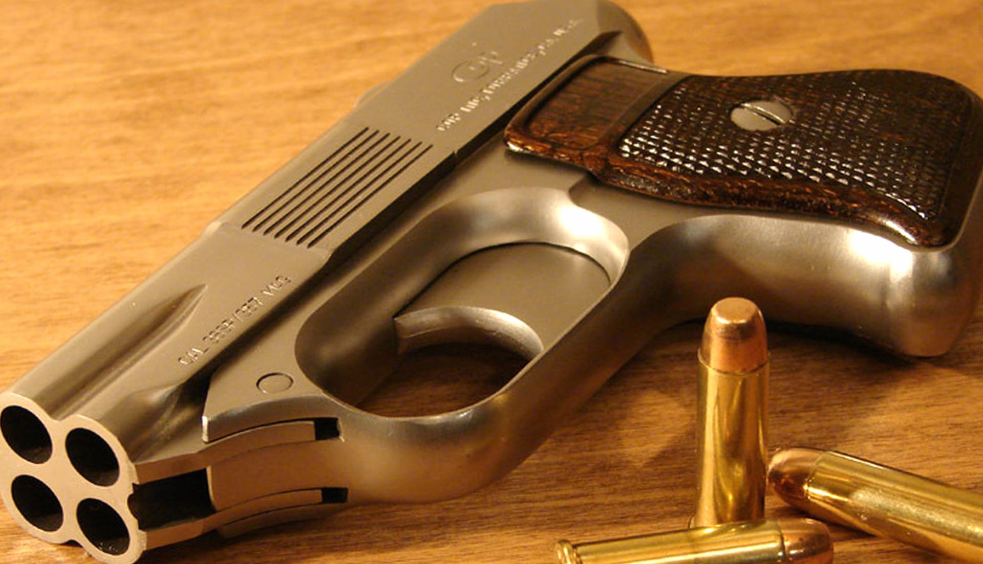 Cop .357 Derringer Pistol at 320 x 480 iPhone size wallpapers HD quality