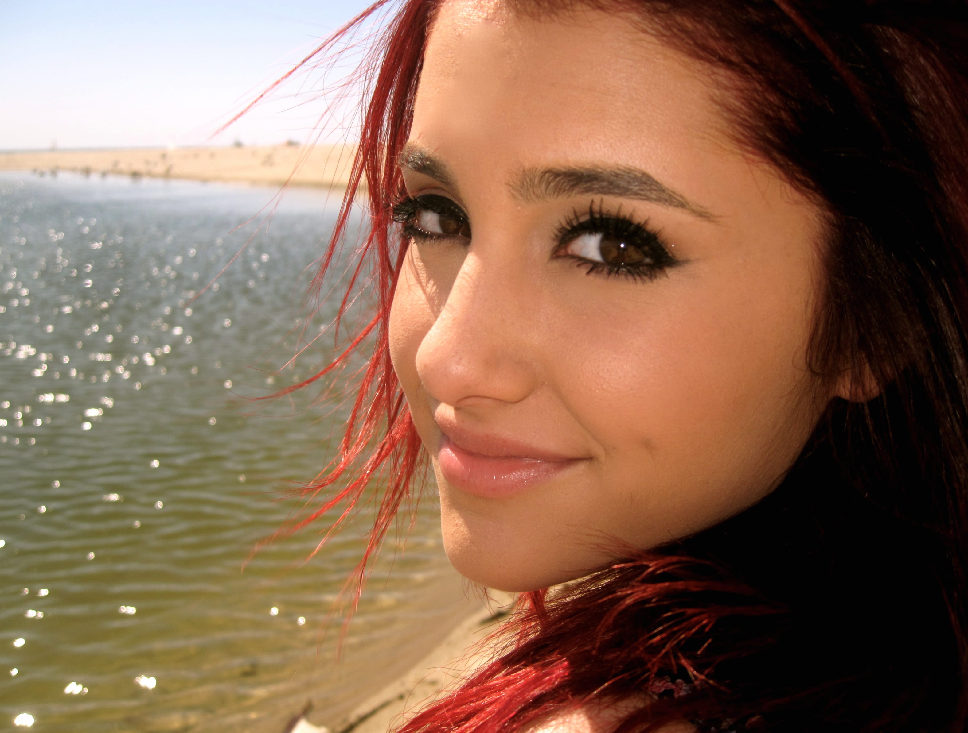 Ariana Grande HD Beachside Wallpaper at 1366 x 768 HD size wallpapers HD quality