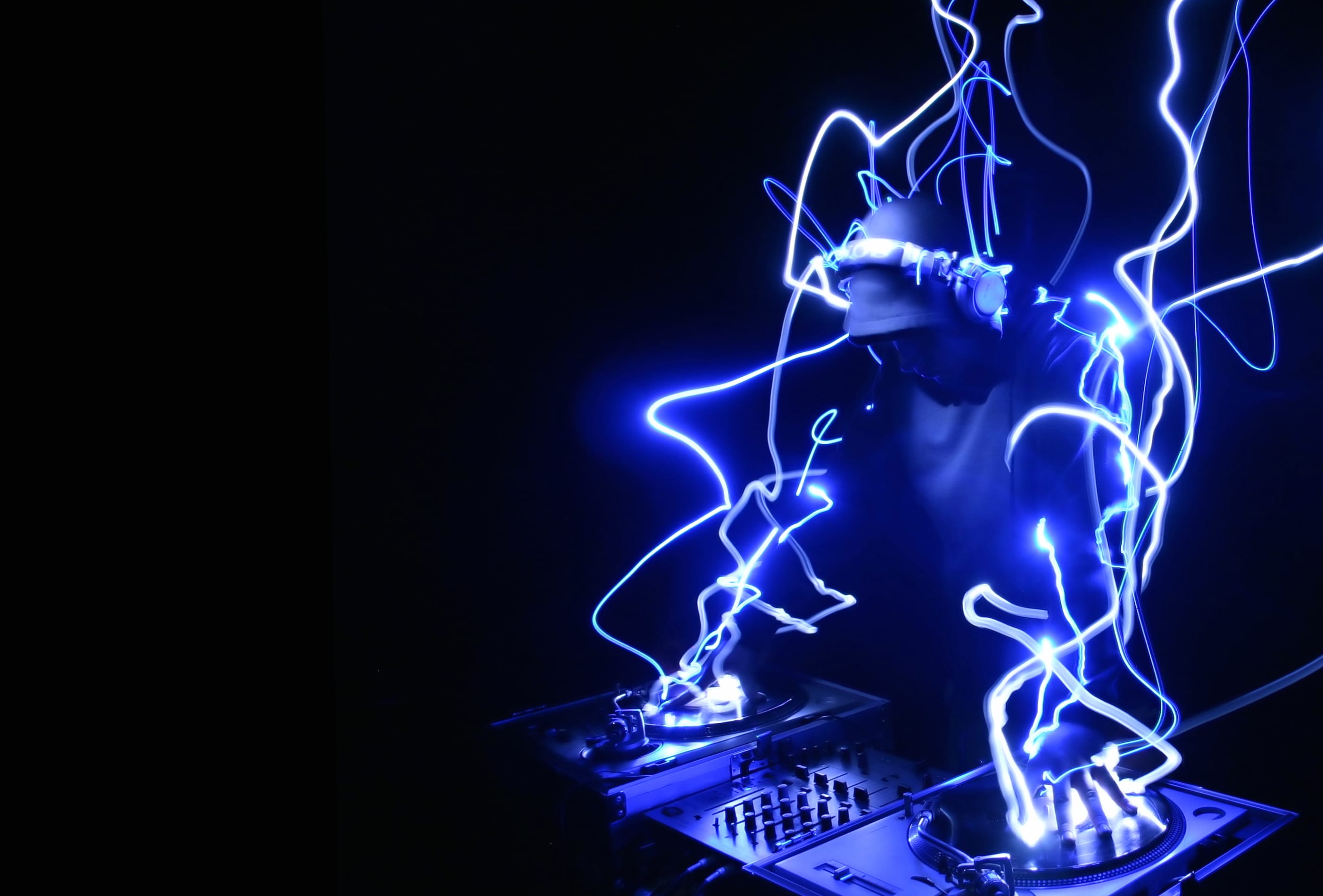 Electric Vibes of a Dynamic DJ Scene at 2048 x 2048 iPad size wallpapers HD quality