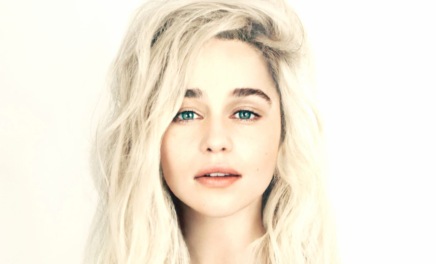 Emilia Clarke Stunning Close-Up with Green Eyes at 2560 x 1440 HD size wallpapers HD quality