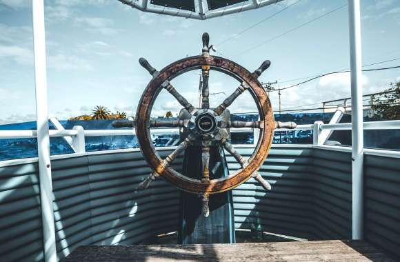 HD Wallpaper of a Classic Boat Steering Wheel