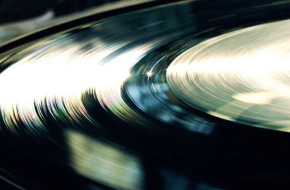 HD Wallpaper of a Spinning Vinyl Record The Essence of Music