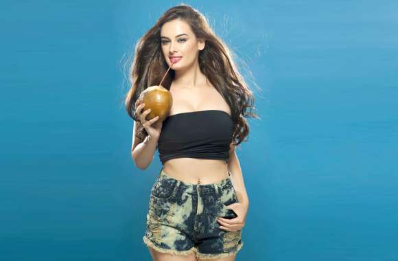 HD Wallpaper of Evelyn Sharma Enjoying a Cocktail