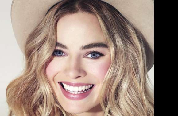 Margot Robbie Stunning with Blue Eyes and a Smile