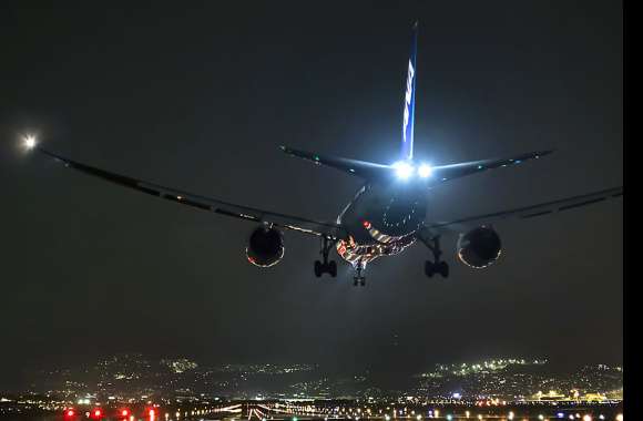 Nighttime Cityscape of Aircraft in Flight