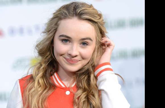 Sabrina Carpenter Blonde Beauty with Blue Eyes