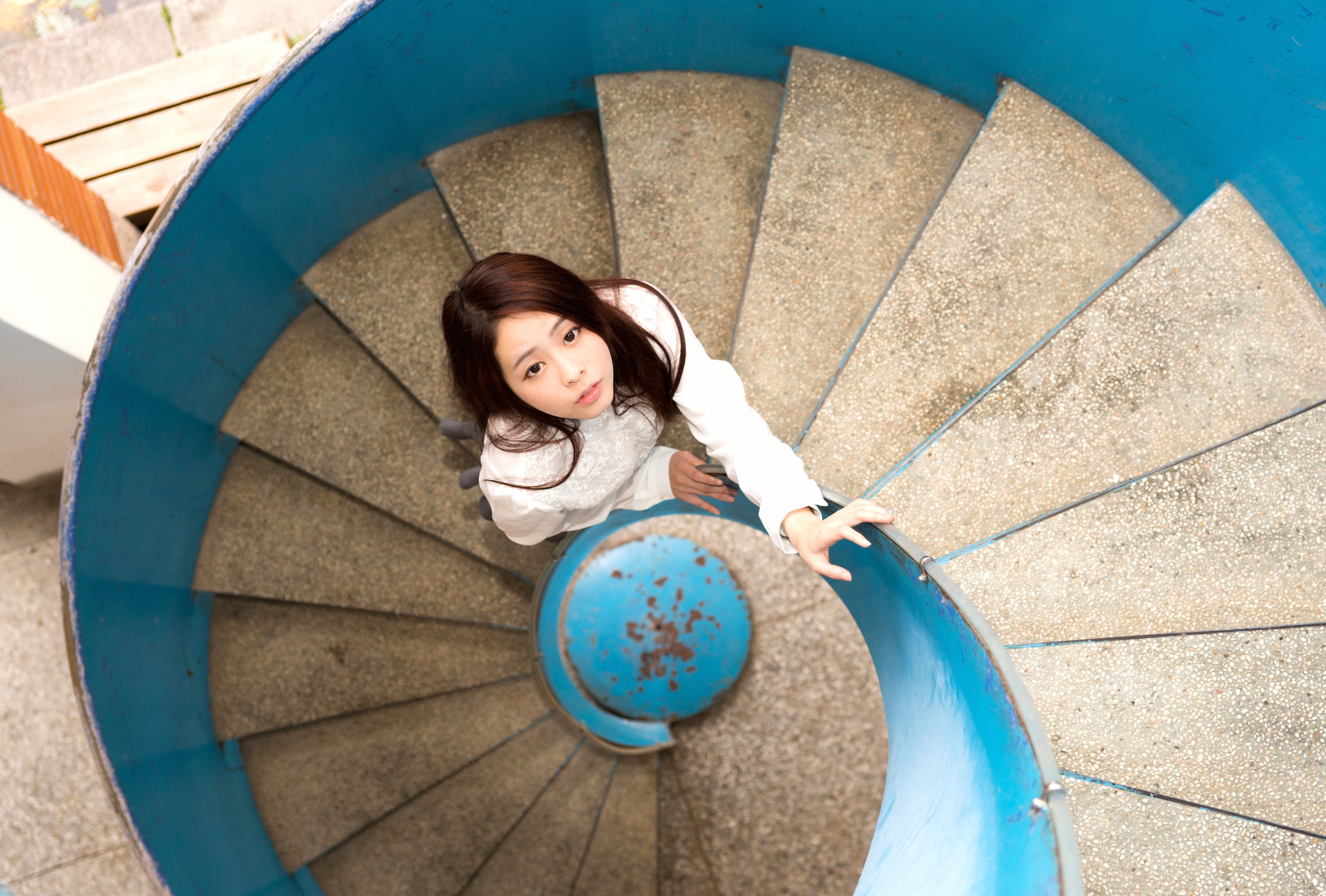 4K Ultra Asian Woman on Spiral Stairs wallpapers HD quality