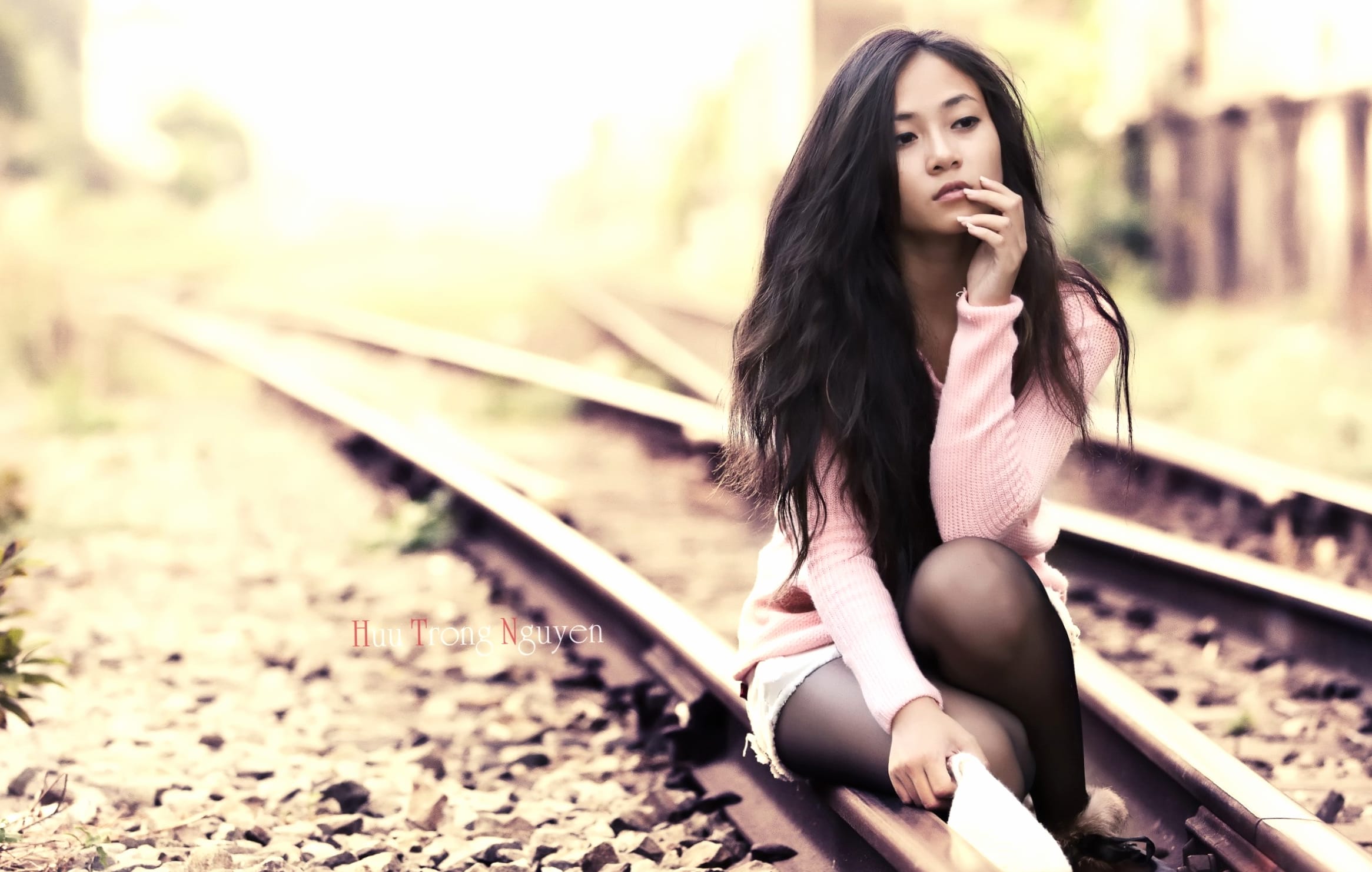 Contemplative Mood - Woman on Tracks at 640 x 960 iPhone 4 size wallpapers HD quality