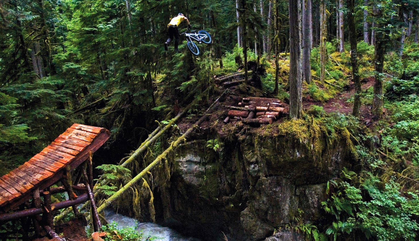 Extreme BMX Forest Jump at 320 x 480 iPhone size wallpapers HD quality