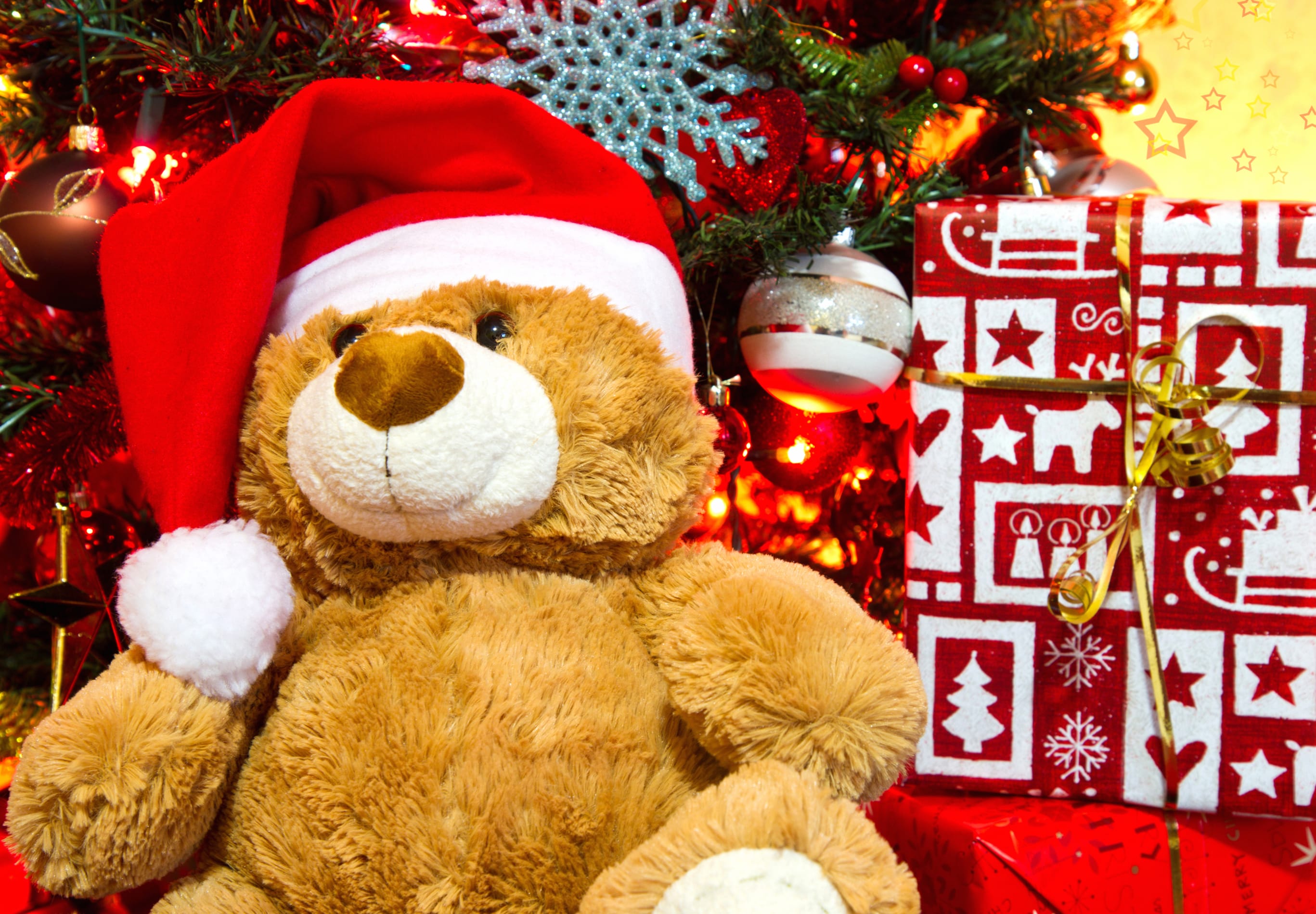 Festive Teddy Bear in Santa Hat Among Christmas Ornaments wallpapers HD quality