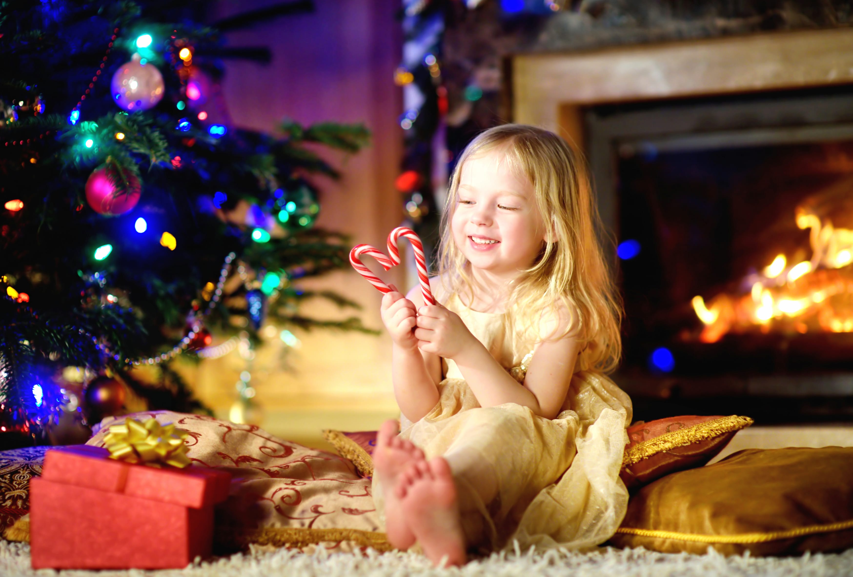 Gift Fireplace Blonde Christmas Candy Cane Little Girl Photography Child at 320 x 480 iPhone size wallpapers HD quality