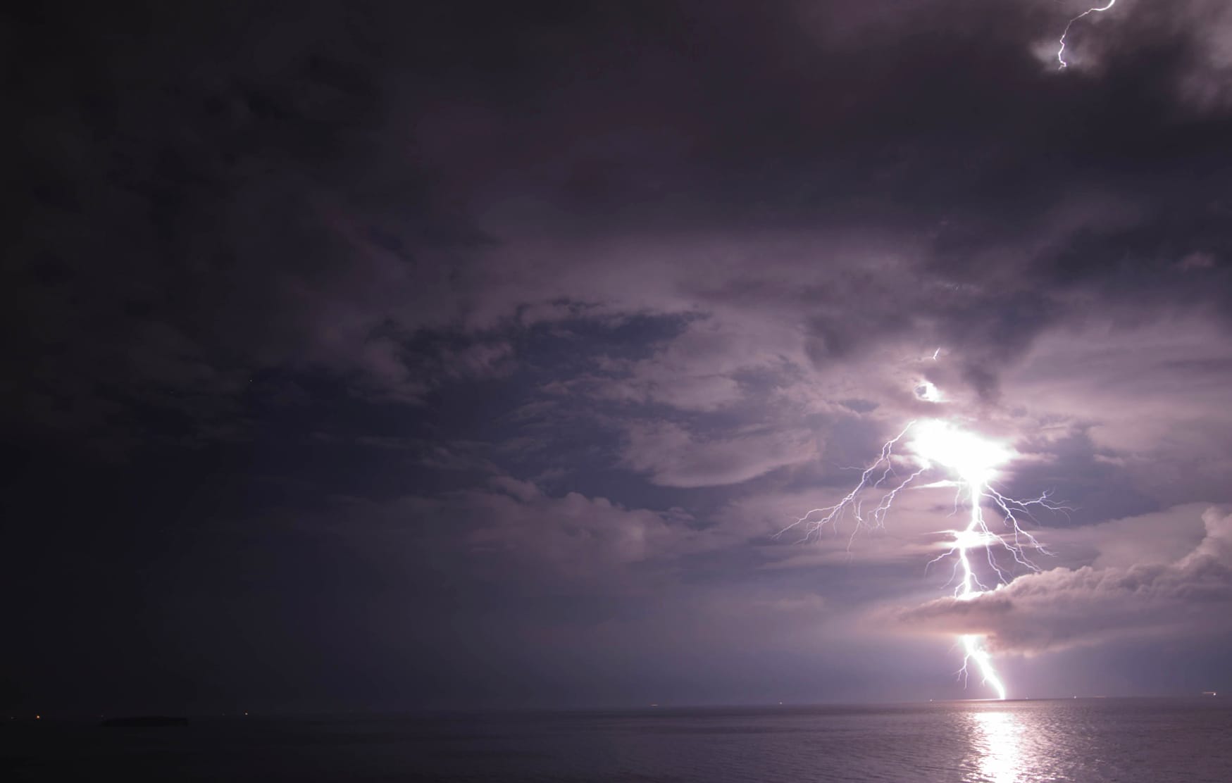 Majestic Lightning Over Sea and Sky at 2560 x 1440 HD size wallpapers HD quality