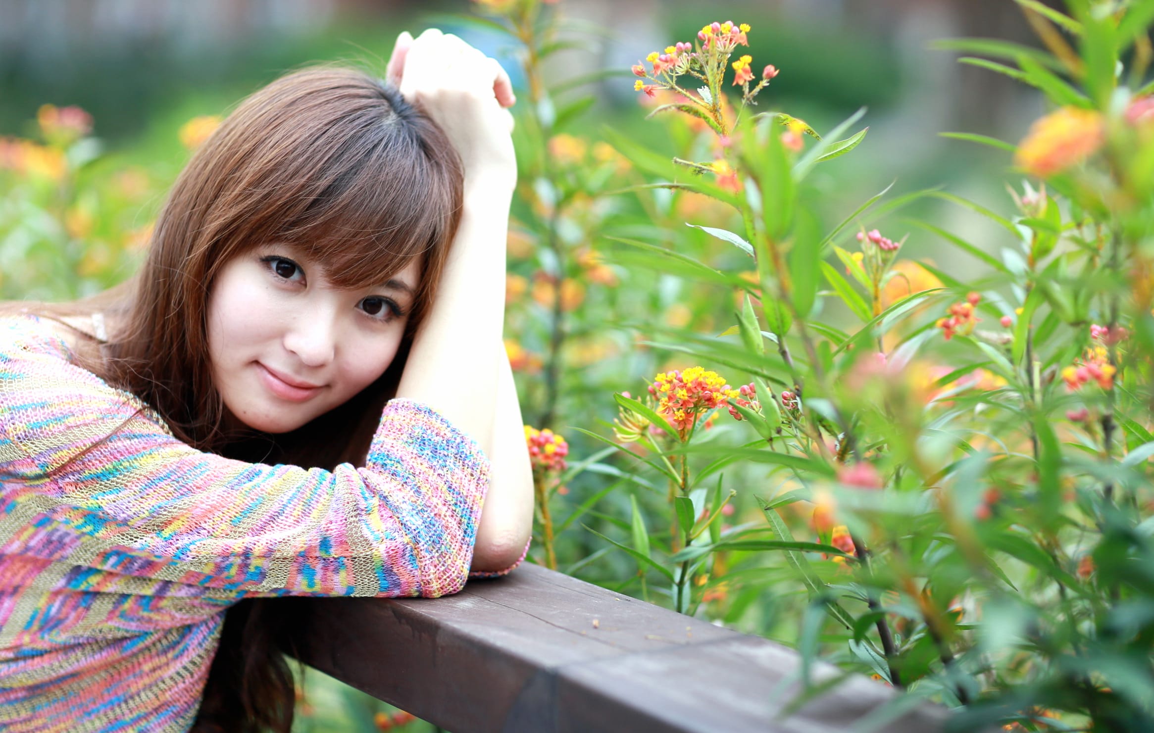 Serene Asian Woman in Garden - at 640 x 960 iPhone 4 size wallpapers HD quality