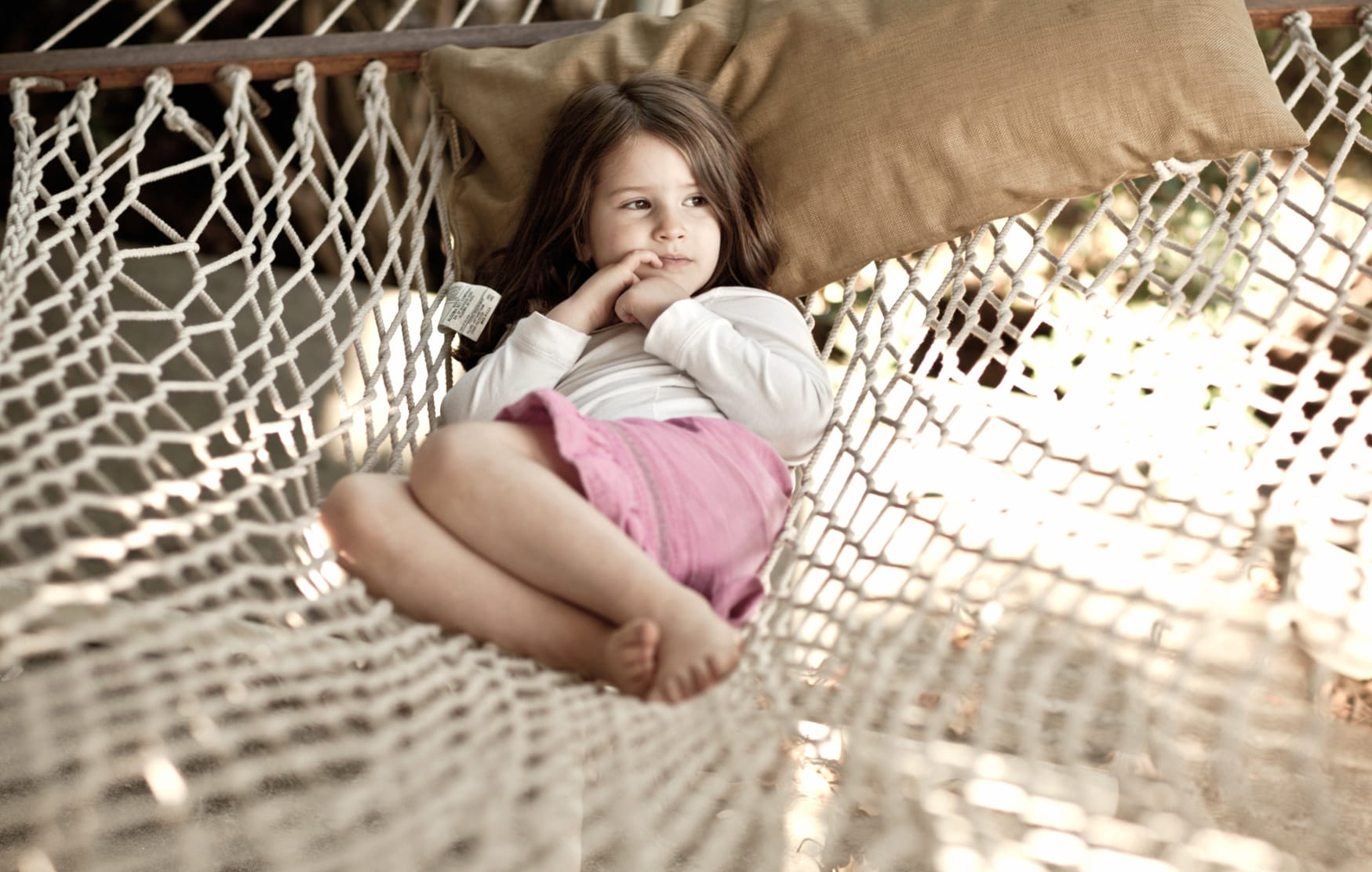 Serene Moments of a Child in a Hammock at 1152 x 864 size wallpapers HD quality