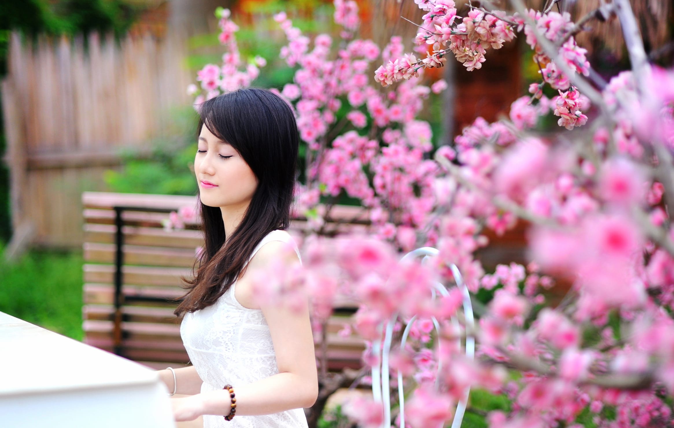 Tranquil Blossom Asian Woman at 1600 x 1200 size wallpapers HD quality