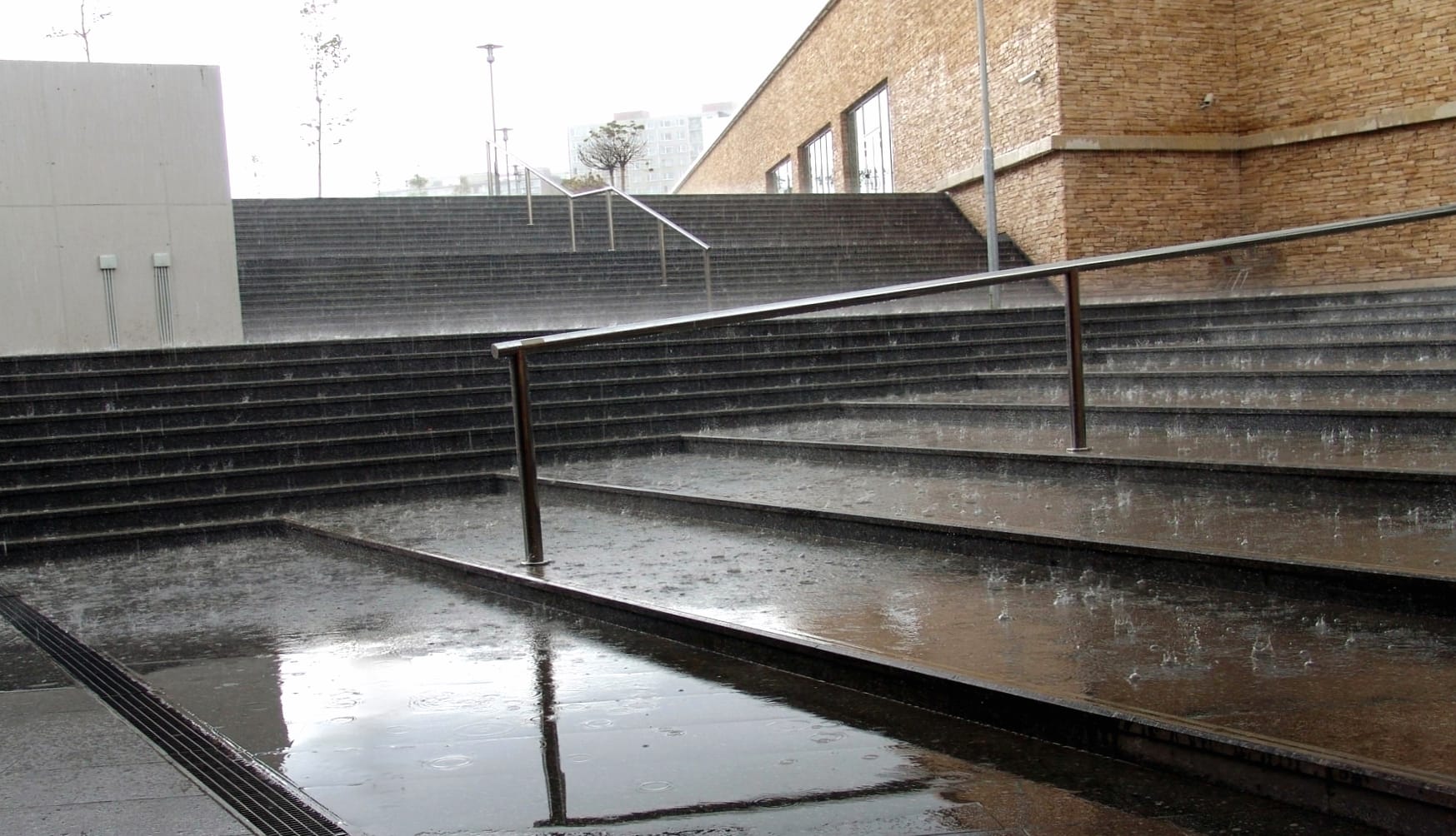 Tranquil Rainfall on Urban Steps at 1600 x 1200 size wallpapers HD quality