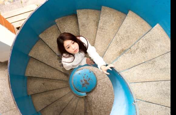 4K Ultra Asian Woman on Spiral Stairs