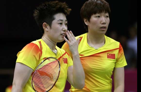 Dynamic Badminton Duo - HD Sports Wallpaper