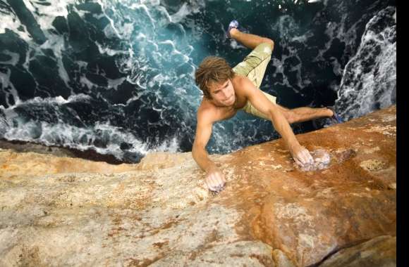 Epic Rock Climbing Adventure Over Ocean Waves