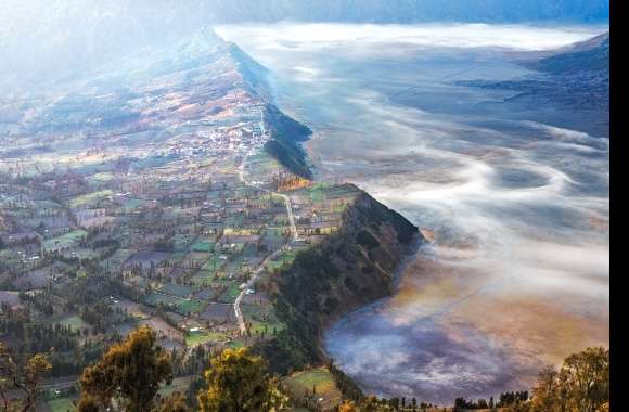 Fogs Over the Serene Valley Village in Java, Indonesia