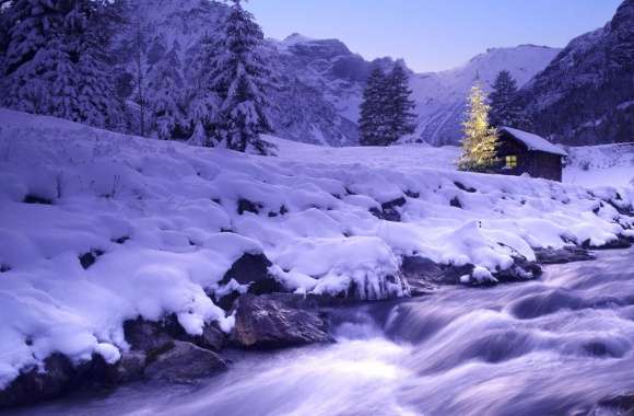 Magical Christmas Landscape of a Snowy River and Mountain Scene