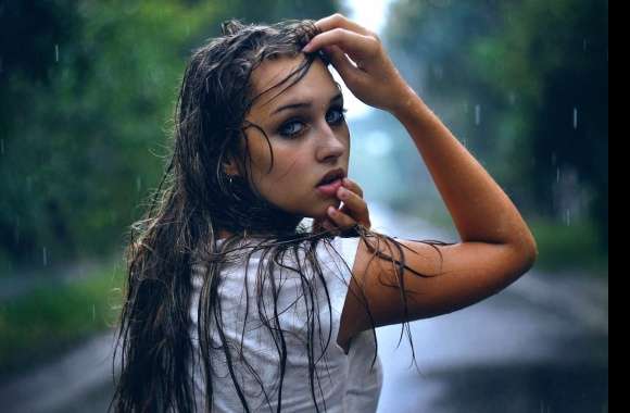 Moody Woman in Rainy Street