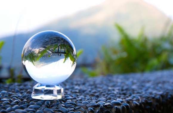 Reflective Serenity A HD Glass Globe Wallpaper