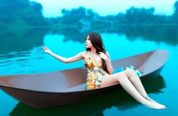 Serene Asian Woman in Boat -