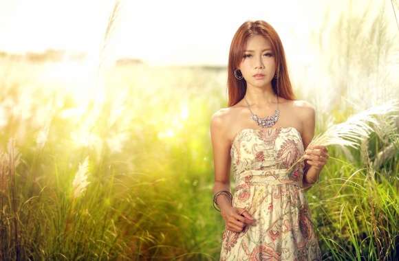 Serene Asian Woman in Field -