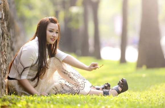 Serene Moment - Asian Woman in Park